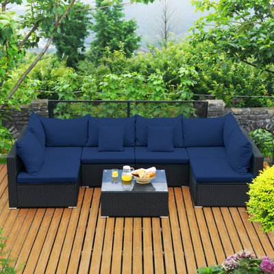 Finnbar Patio 7 Piece Rattan Sectional Seating Group with Cushions by Latitude Run