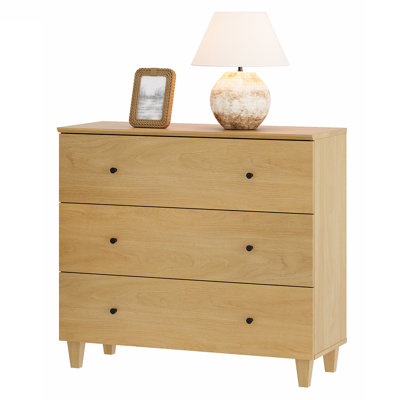 Lawncrest 3-Drawer Solid and Manufactured Wood End Table
