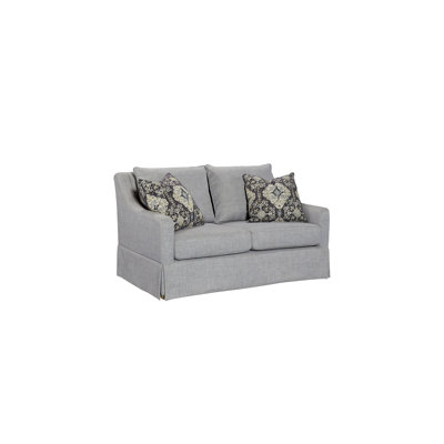 Causeuse confortable avec jupe, coussins réversibles et deux coussins pour une expérience relaxante et élégante