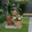Statue d'extérieur de jardinière solaire chiot assis