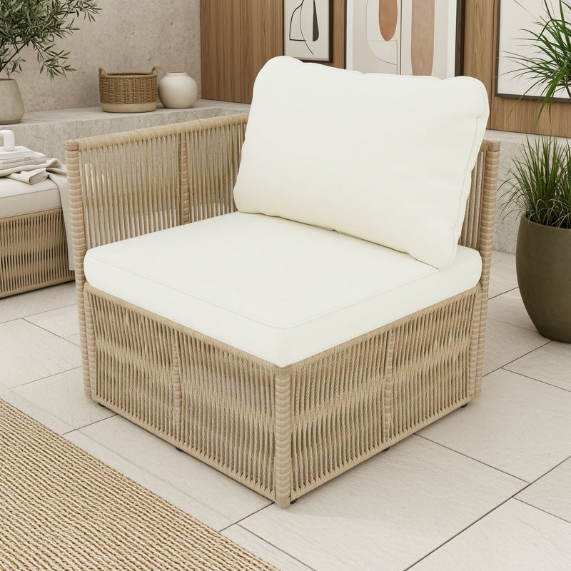 Ensemble canapé d'angle extérieur en rotin avec coussins et table basse en verre