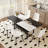 Table And Chair Set. Black Spliced Dining Table With Storage Function In The Middle Of The Table Legs.Paired With White Artificial PU Chairs With Curved Widened Cushion Design.-1555878761
