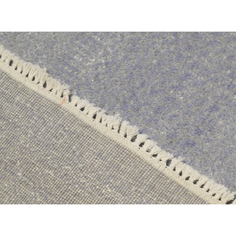 Tapis bleu de haute qualité noué à la main