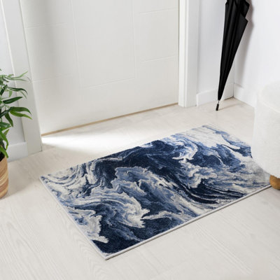 Tapis abstrait bleu en polypropylène tissé à la machine Jacleen