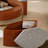 Doughlin Modern Round Lift-Top Coffee Table In White And Natural Wood