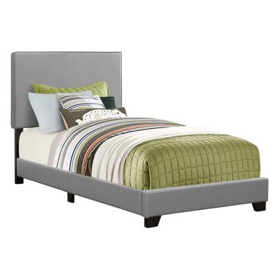Lit simple rembourré avec aspect en cuir gris pour un look chic et un design compact