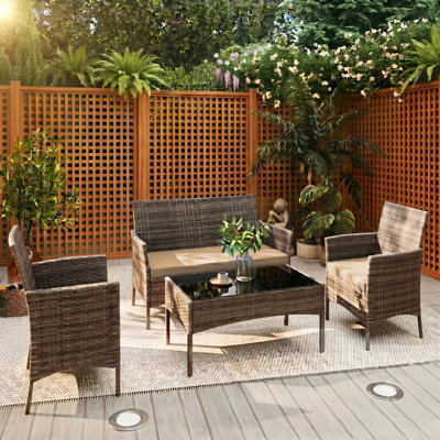 Ensemble de 4 meubles de patio en rotin PE pour l'extérieur, ensemble de conversation en osier résistant aux intempéries avec causeuse, 2 fauteuils simples, table basse en verre trempé et coussins bleus lavables pour le porche de jardin