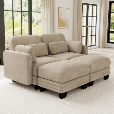 Canapé d'angle modulaire capitonné avec poufs amovibles