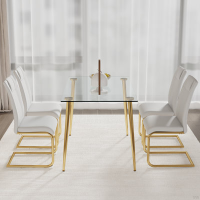 Table And Chair Set.Rectangular Dining Table With Tempered Glass Tabletop And Gold Plating Metal Legs.Paired With 4  Chairs With Gold Metal Legs. Modern Light Luxury.