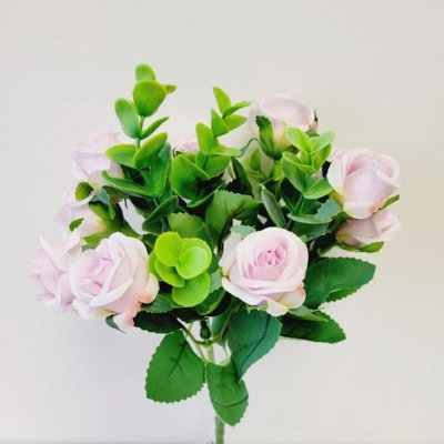 Mini roses lilas et buissons d'eucalyptus