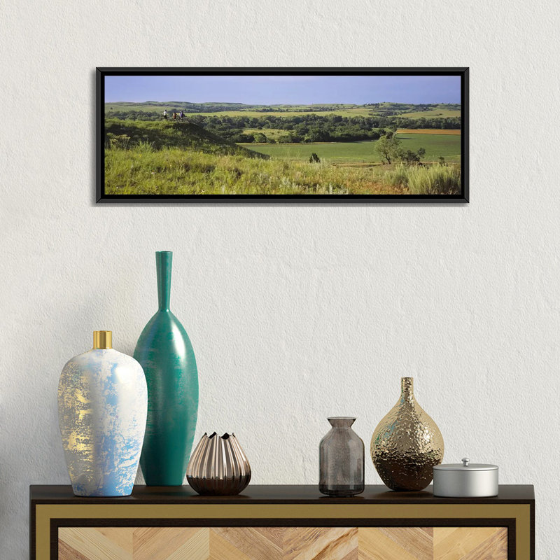 " Three Mountain Bikers On A Hill, Kansas, USA " by Panoramic Images, 12" H x 36" W x 1.5" D, Black Framed