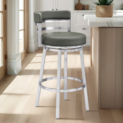Deherrera Modern Swivel Counter or Bar Stool with Open Low Back and Footrest in Metal and Faux Leather