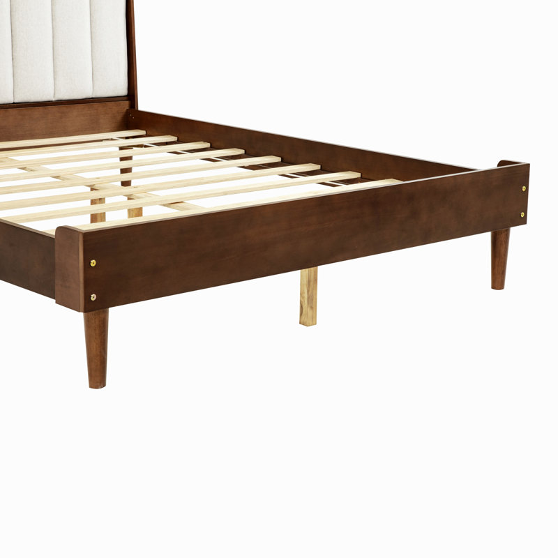 Lit en bois avec tête de lit tapissier