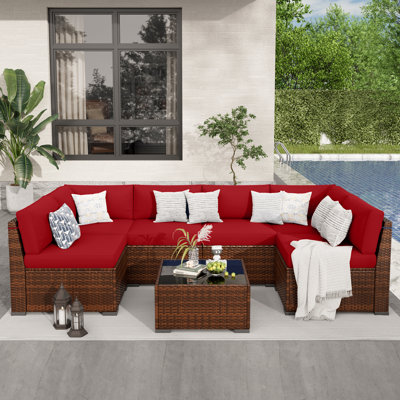 7 Piece Rattan Sectional Seating Group with Cushions
