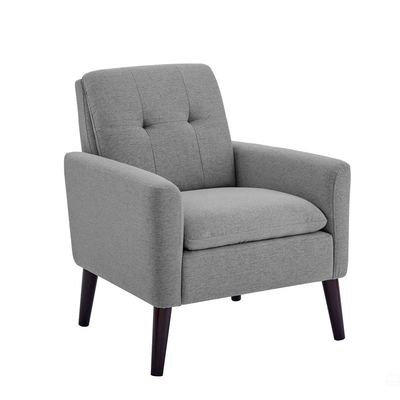 Fauteuil capitonné et rembourré