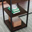 Bureau spacieux en forme de L avec tiroirs cachés et structure en métal durable, parfait pour le bureau à domicile et les espaces polyvalents.