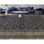 Tapis noir et doré de haute qualité noué à la main