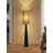Modern minimalist iron and fabric floor lamp.