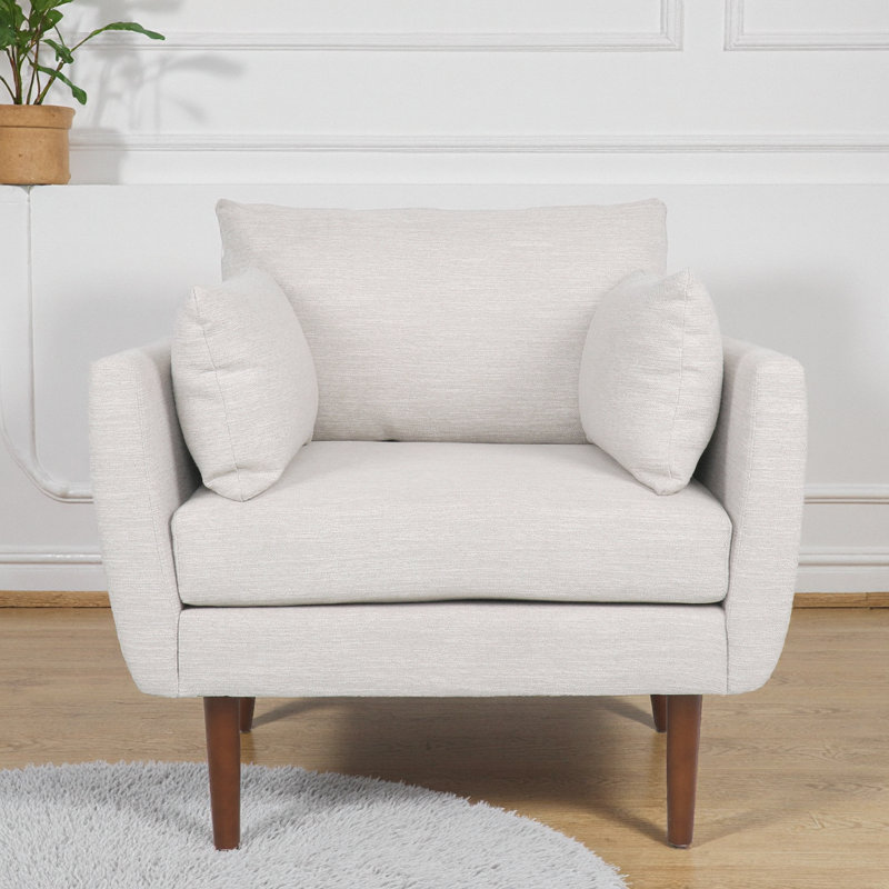 Élégant fauteuil club en tissu beige: un confort intemporel pour votre espace de vie