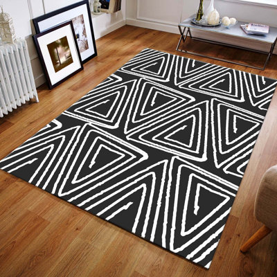 Tapis noir / blanc en jute tissé à la machine Oswayo