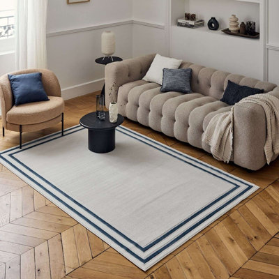 Carmel Modern Bordered Cream/Navy Area Rug