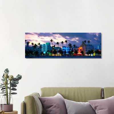 Buildings Lit Up At Dusk, Ocean Drive, Miami Beach, Florida, USA - Wrapped Canvas Panoramic Print