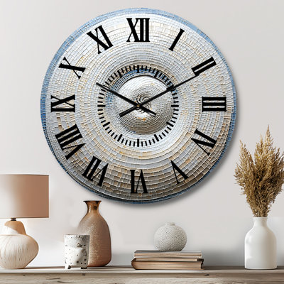 Horloge murale argentée