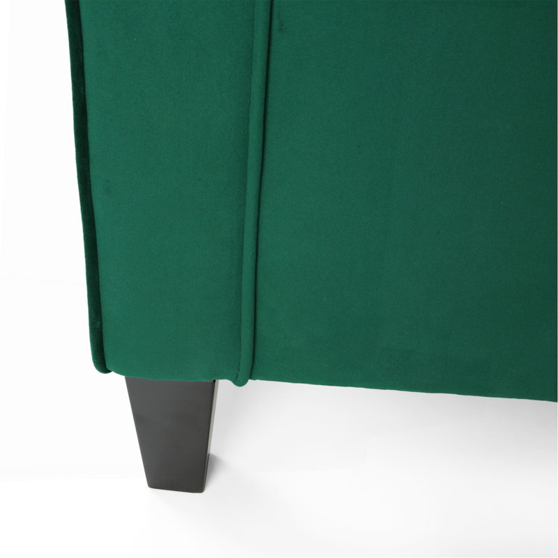 Fauteuil club en velours vert