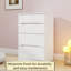 Commode de chambre à coucher avec miroir à plateau ouvert et plateau de table en verre visible 