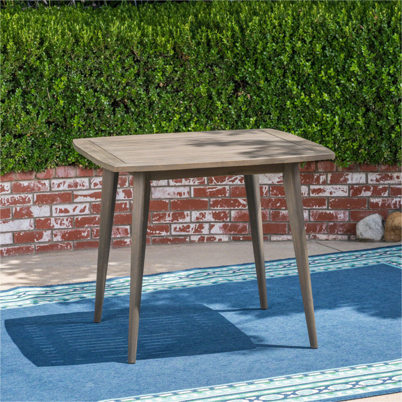 Table d'extérieur carrée en bois d'acacia avec pieds droits