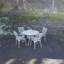 Ryne 4 - Person Patio Dining Set with Round Table , Cushions Included-41176032