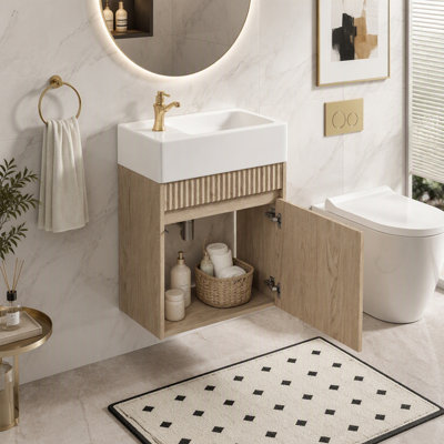 Compact Floating Bathroom Vanity with Resin Sink, Handleless Push-to-Open, and Soft-Close Hinges for Modern Spaces