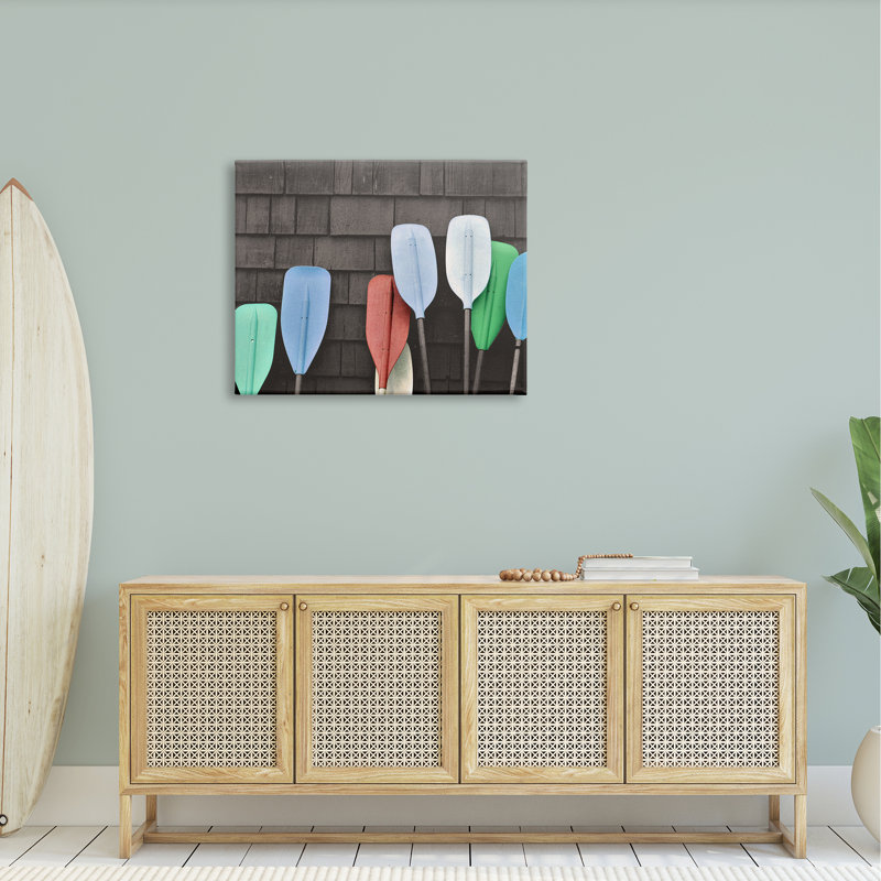 «Mixed Ores Against Beach Shed Boating Paddle» par Daphne Polselli - photographie, H 30 po x l 40 po x P 1,5 po, Toile tendue