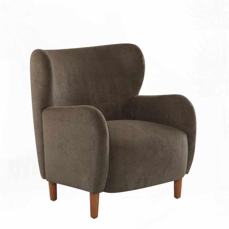 Fauteuil club à oreilles en velours