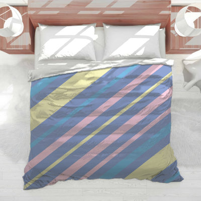 Édredon pastel à rayures diagonales
