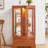 Lighted Glass Curio Cabinet With Adjustable Shelves, Vintage Handles, Anti - Tip Device, Drawer And Mirrored Back For Displaying Treasured Items