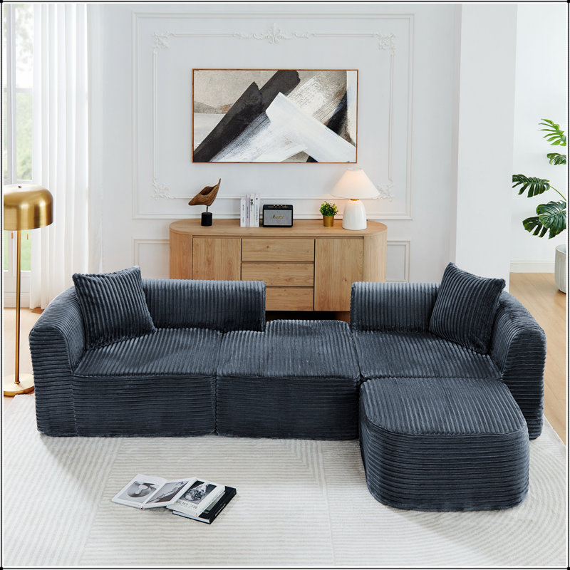 Canapé d'angle modulaire spacieux avec pouf amovible et méridienne pour un confort optimal dans votre salon, sans assemblage requis.