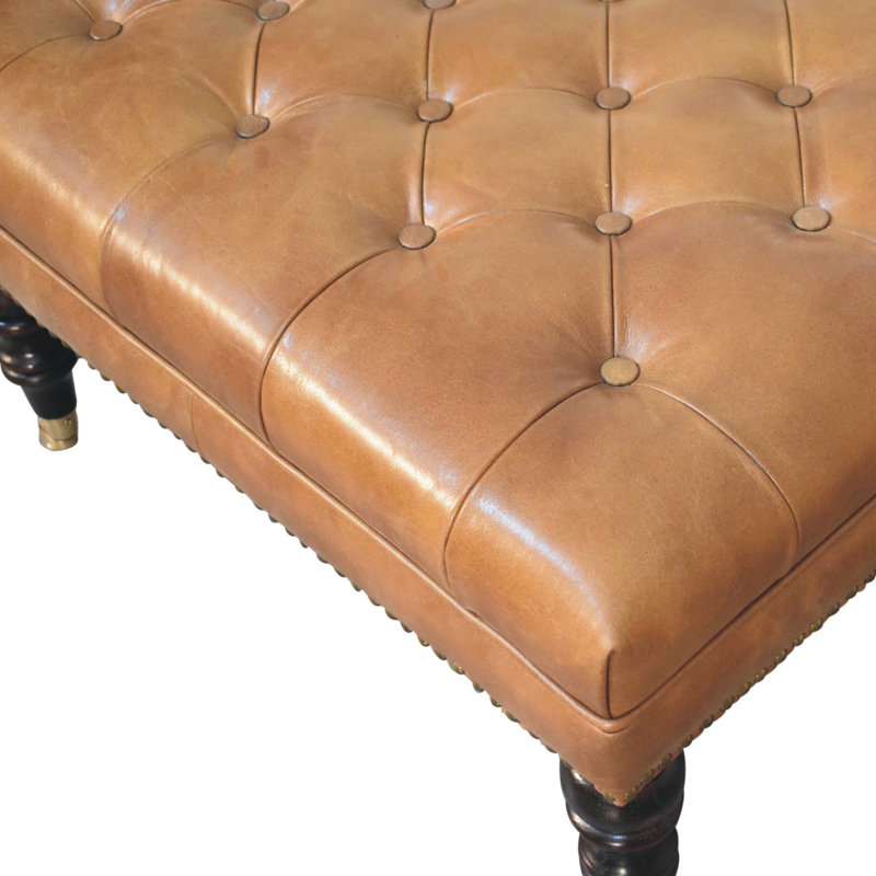 Studded Buffalo Tan Leather Ottoman With Castor Legs