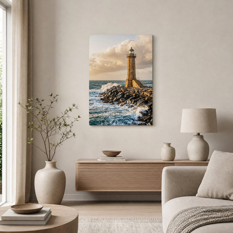 Tableau sur toile représentant un phare en pierre sur une côte rocheuse avec des vagues océaniques, H 36 po x l 24 po