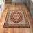 Shiflett Oriental Burgundy/Mustard/Black Area Rug-1756067252