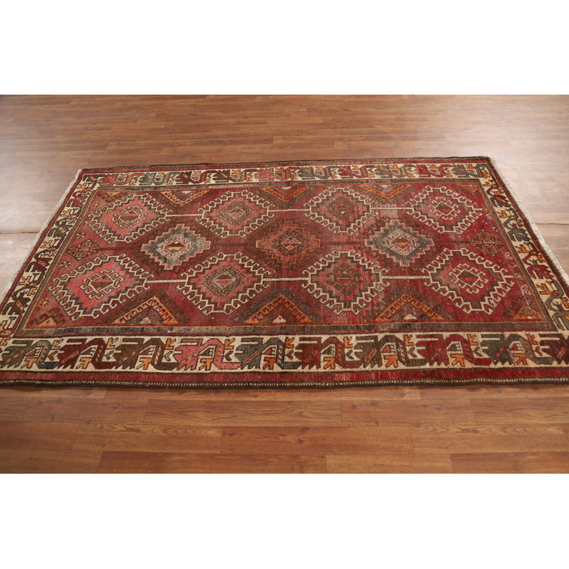 Tapis rouge et rose en laine à motif géométrique 4 x 7