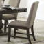 Ensemble de salle à manger 6 pièces de style traditionnel avec table à double piédestal et chaises rembourrées beiges, parfait pour une expérience élégante et confortable
