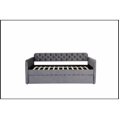 Lit de jour rembourré luxueux avec couchette et charge USB, parfait pour le confort et la commodité modernes.