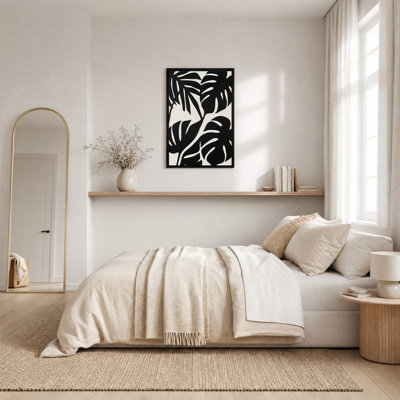 Tableau sur toile à motif de feuilles tropicales noires et crème