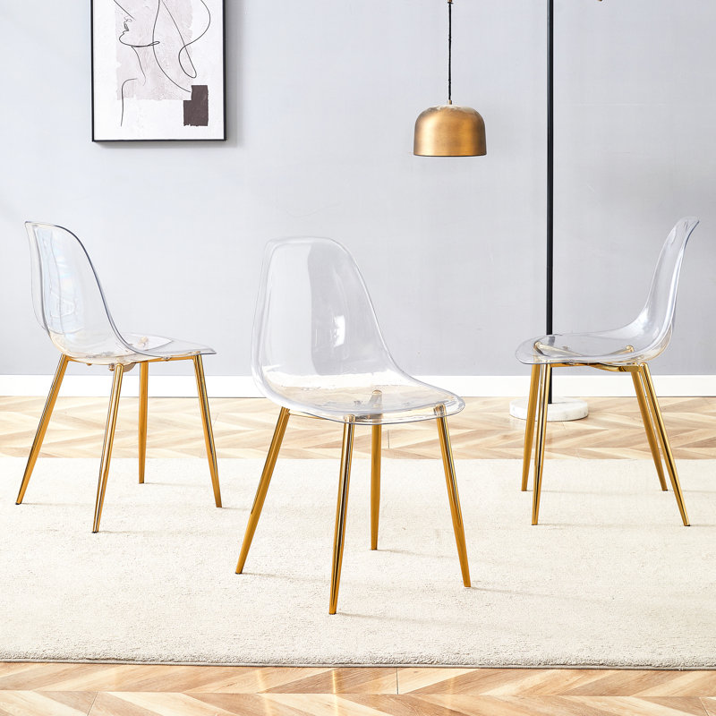 Fauteuil transparent confortable et confortable pour les repas - expérience relaxante Élégant siège à pieds en métal doré Design chic