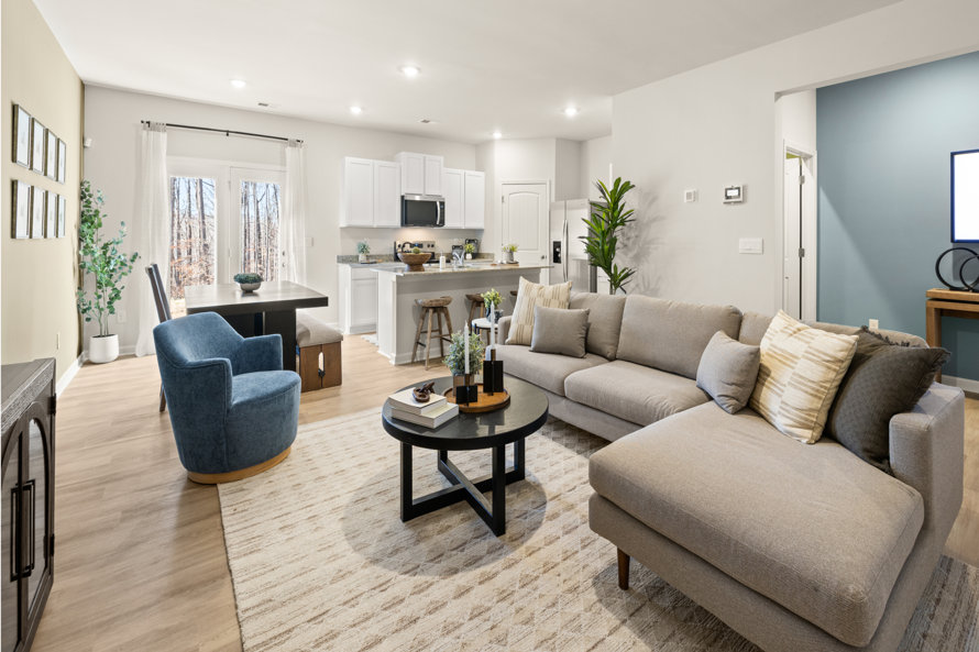 Open concept living, dining, and kitchen area.