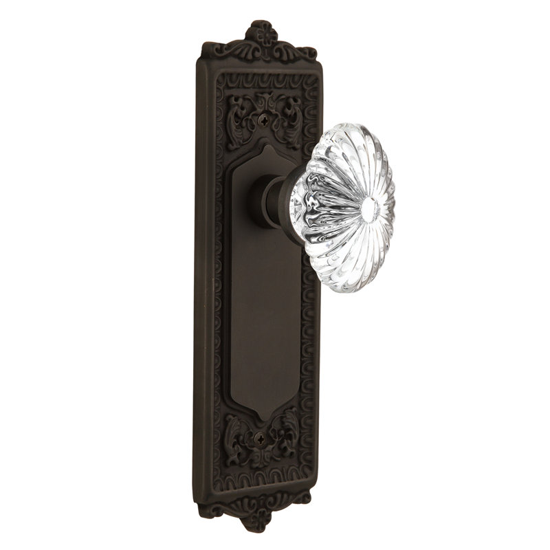 Egg & Dart Plate avec bouton de porte ovale en cristal cannelé, Bronze frotté à l'huile