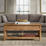 Table basse à plateau relevable avec rangement et reposant sur quatre pieds Mccaslin
