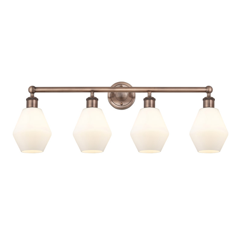 Éclairage pour meuble-lavabo 4 lumières 33 pouces Gabbie, Blanc mat, Cuivre antique