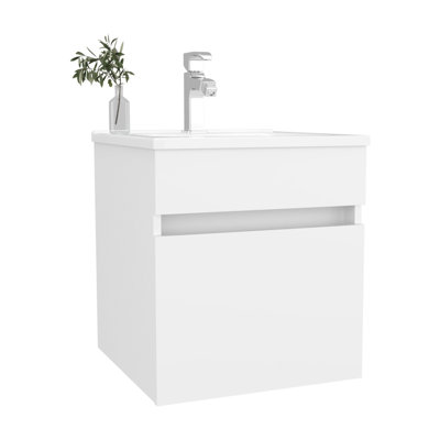 Meuble-lavabo flottant blanc à une porte avec lavabo, fixation murale, esthétique moderne, peu encombrant, forme rectangulaire épurée et look de panneau de particules pour salle de bain contemporaine, matériau